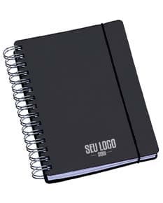 Agenda compacta com acabamento Wire-o, elástico na cor azul e peso de 63g.