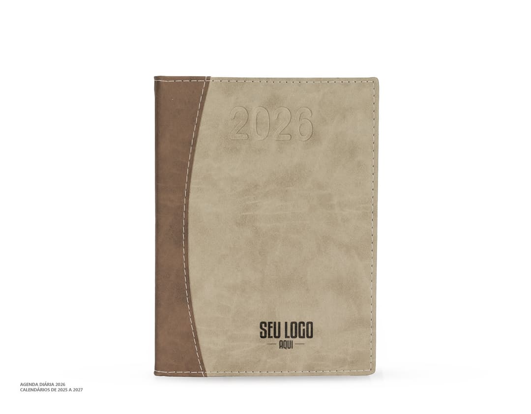 Agenda Diária 2025 com capa preta e detalhes em dourado, vista de cima e aberta mostrando páginas com layout diário para organização.