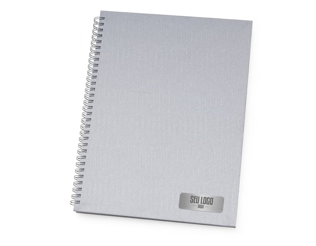 Caderno de Negócios: O acessório ideal para manter suas anotações organizadas no escritório. Com capa dura e páginas em branco, é perfeito para escrever documentos, memorandos e lembretes importantes. Mantenha seu dia a dia mais produtivo com este caderno de alta qualidade!
