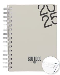 Agenda diária 2025 Wire-o com capa dura na cor preta e detalhes em dourado, apresentando páginas internas decoradas com linhas para anotações diárias.