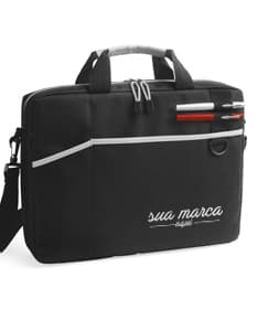 Fotografia de uma pasta preta para notebook de 15,6 polegadas, feita em couro 600D almofadado, com alça, fecho de zíper, botão de metal e bloqueio. O acessório possui um design elegante e moderno, indicado para viagens de negócios e uso pessoal.