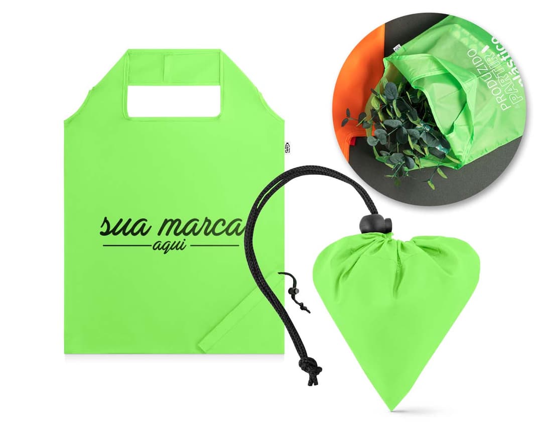 Sacola dobrável em rPET 370 x 420 mm em amarelo e laranja. A imagem mostra uma sacola vazia, com design vazado e espaço para mensagem ou representações. Ideal para compras, presente e utilização em viagens.
