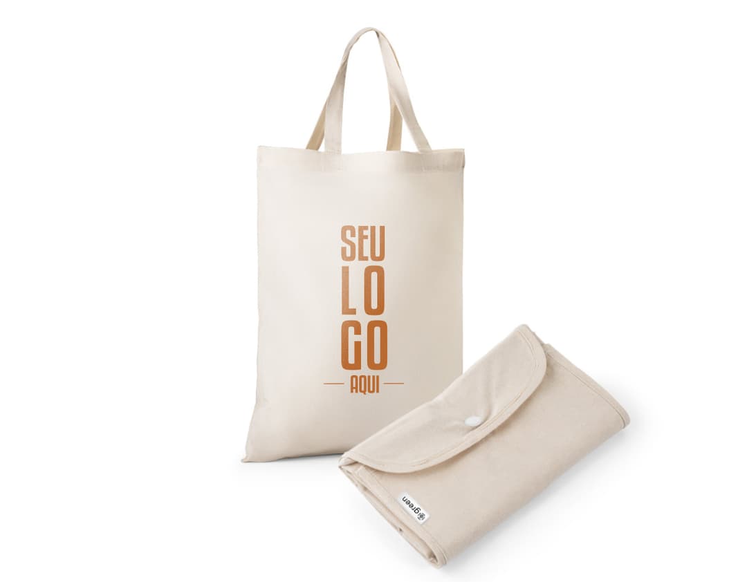 Bolsa de algodão reciclado dobrável, com design vintage. Feita de material eletrônico antigo, com espaço vazio para colocar documentos e objetos diversos. Cor marrom e amarela, com detalhes em plástico e metal. Ideal para uso no escritório, escola ou em viagens.