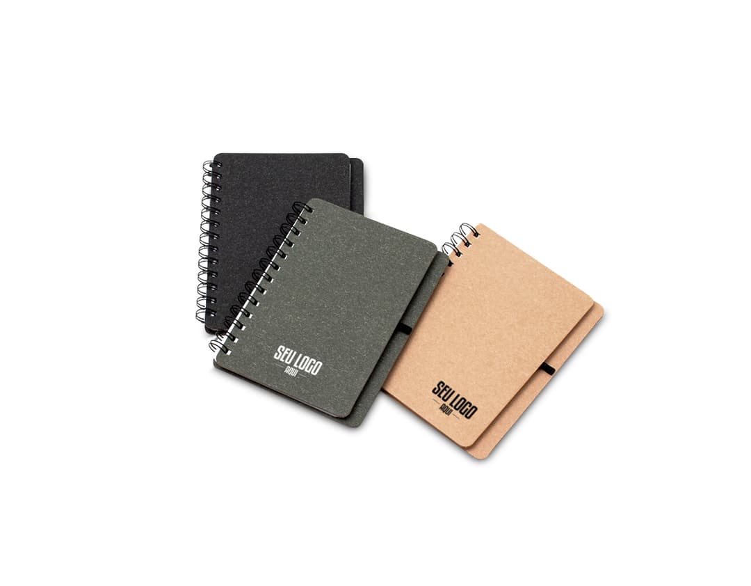 Caderneta Kraft B6 com Porta Caneta - Ideal para anotações diárias, esta caderneta kraft possui um prático porta caneta acoplado. Perfeita para organização e praticidade no dia a dia. Adquira a sua agora!