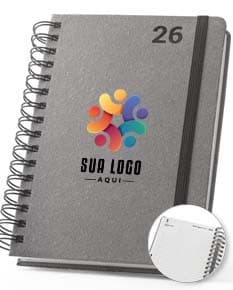 Agenda com argolas para o ano de 2026, na cor preta e com detalhes em dourado.