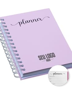 Planner Percalux Anual com capa dura, folhas em branco e marcador de página.