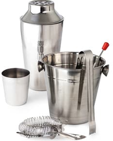 Kit Bar Inox composto por utensílios de bar em aço inoxidável, incluindo coqueteleira, medidor, pegador de gelo, colher bailarina, dosador, socador e pinça.