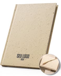 Produto: Caderno A5 com resíduos da cevada. Imagem do caderno de tamanho A5 com capa feita de resíduos da cevada.