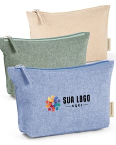 Bolsa de algodão em cor bege, com alças curtas e detalhes em marrom. Possui um bolso frontal com zíper e estampa floral delicada.