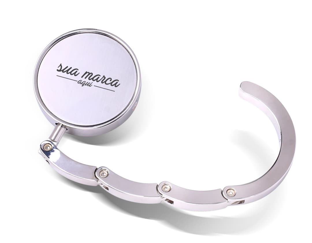 Suporte dobrável para bolsa - 01: Metal brilhante e resistente, símbolo de segurança e elegância. Ideal para presentear e decorar. Compre já!